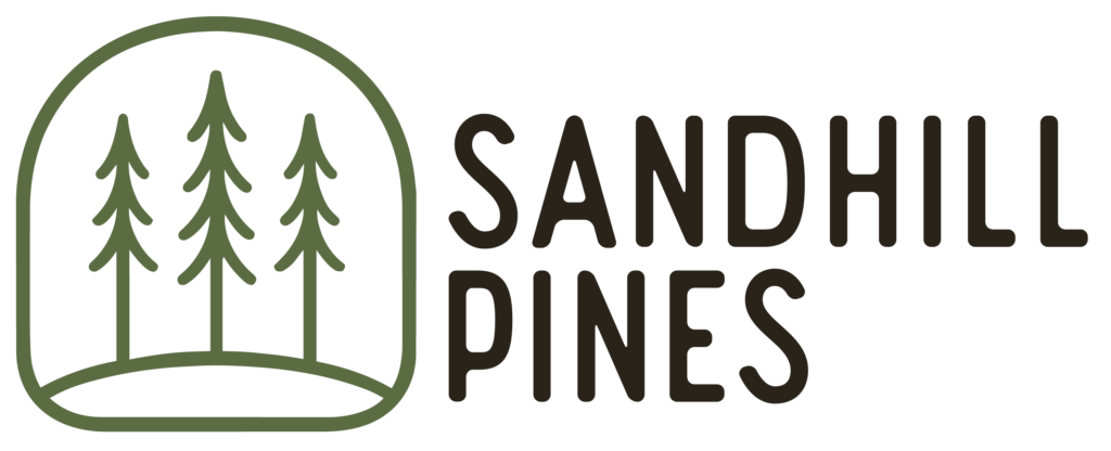 Sandhill Pines logo