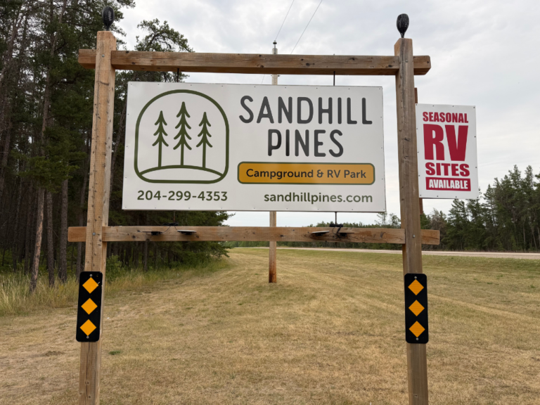New sign for the campground outside the entrance.